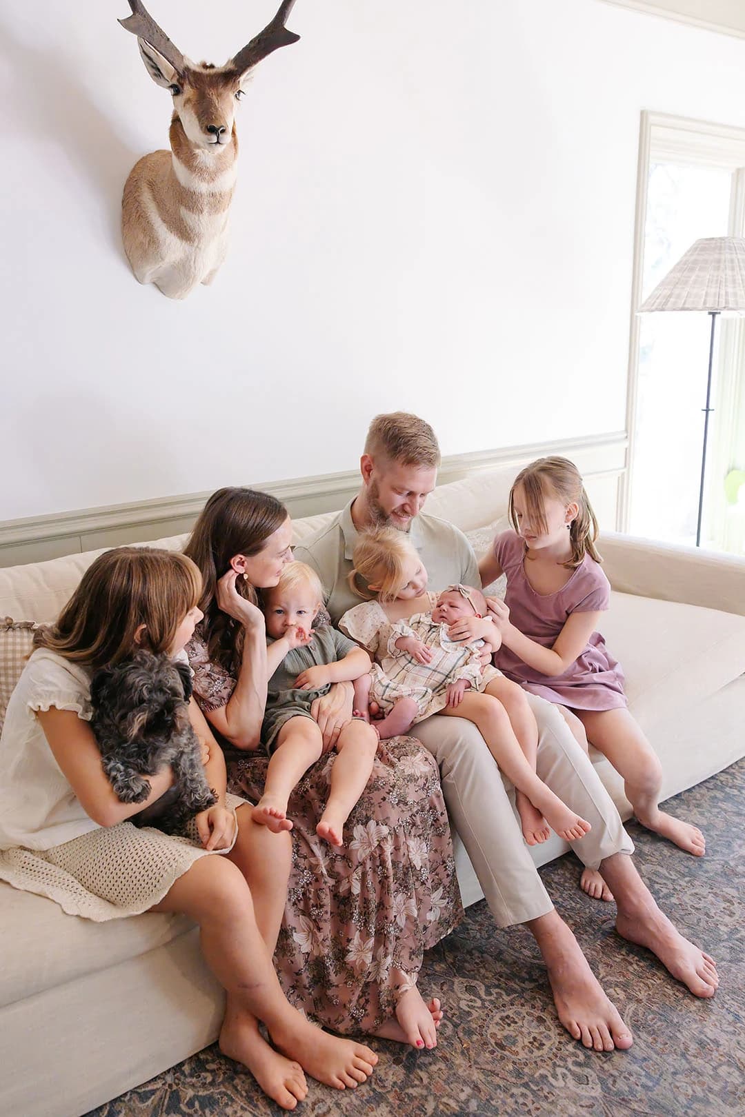 Katie Murray with her husband and five children at home